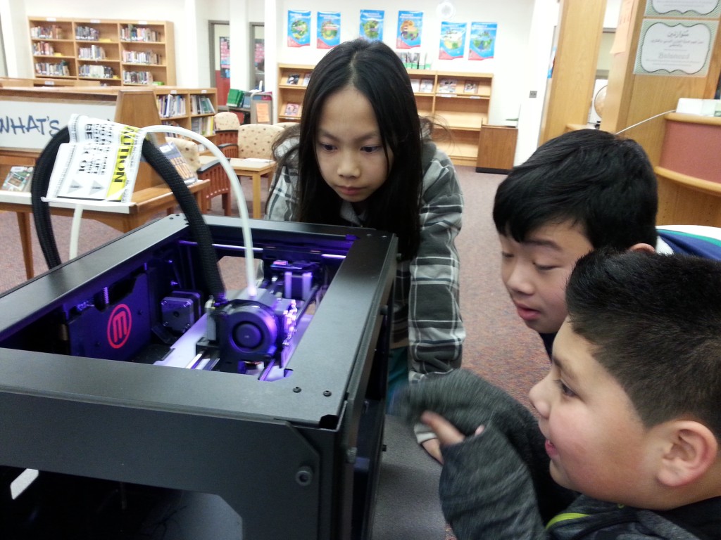 Watching the 3-D printer in action
